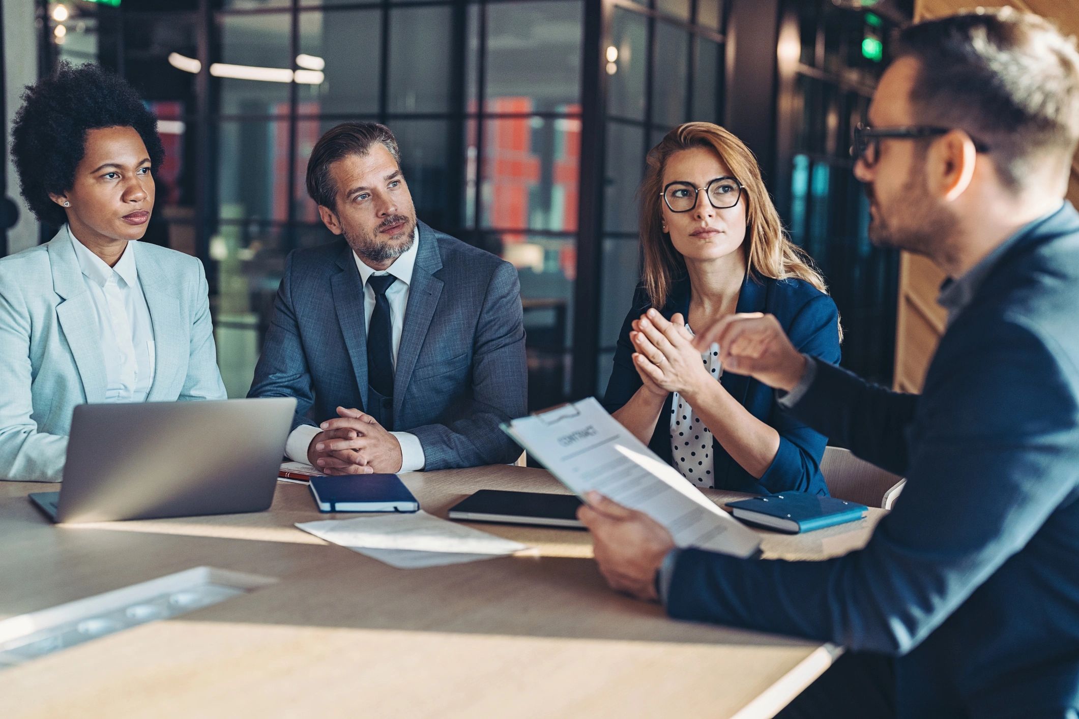 Business leader presenting benefits strategy in a meeting